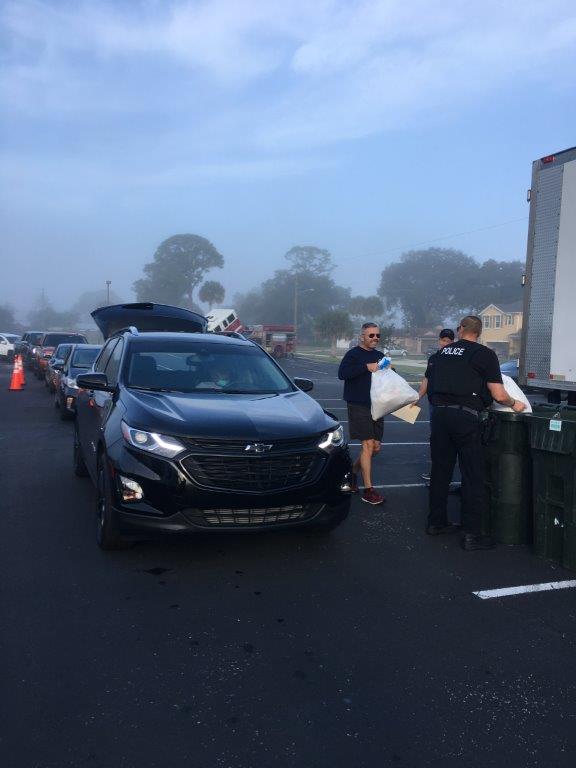 Cars lined up at shred event